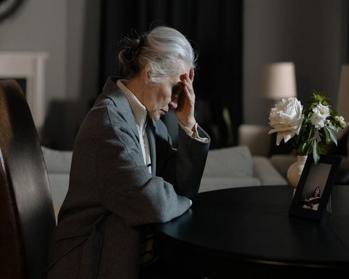 Portrait of an elderly woman sepia tone
